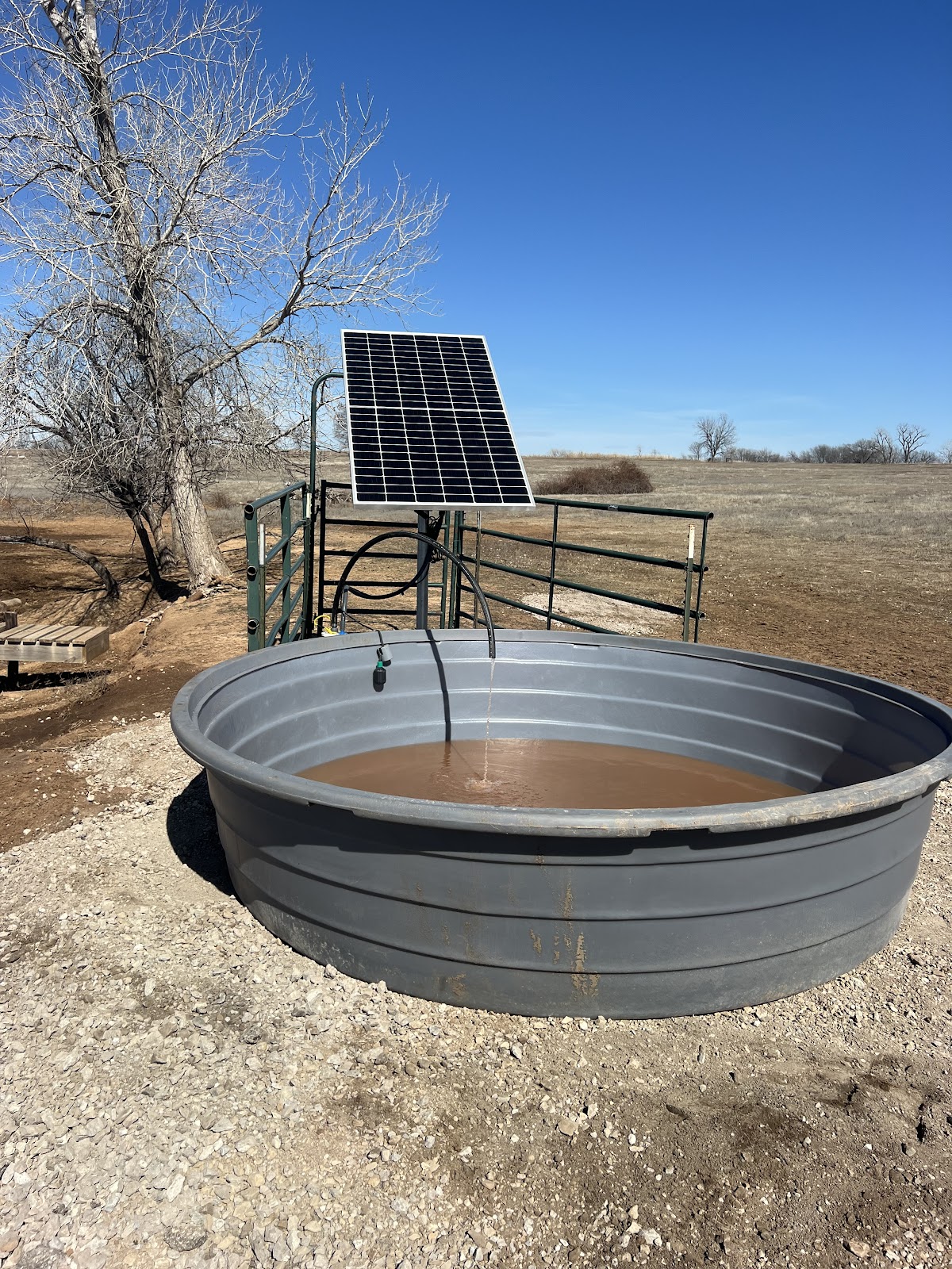 Solar-powered water well and stock tank installed by A & B Lawn Irrigation in Enid, OK